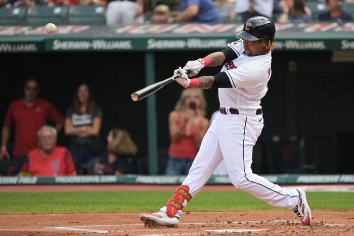 Sep 17, 2022; Cleveland, Ohio, USA; Cleveland Guardians third baseman Jose Ramirez (11) hits a home run during the first inning against the Minnesota Twins at Progressive Field. Mandatory Credit: Ken Blaze-USA TODAY Sports